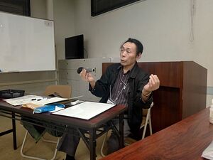 アドバイスをする高橋宏三さん