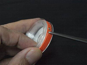 「巻き戻り防止糸巻きベルト」